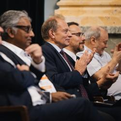 Audience listening to a presentation