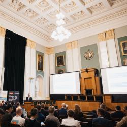 Audience listening to a presentation