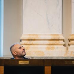 Person listening to a presentation