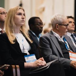 Audience listening to a presentation