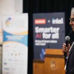 Person giving a presentation in an auditorium