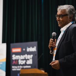 Person giving a presentation in an auditorium