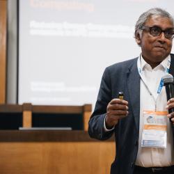 Person giving a presentation in an auditorium