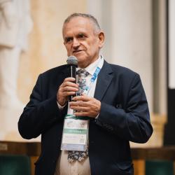 Person giving a presentation in an auditorium