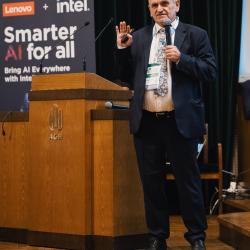 Person giving a presentation in an auditorium