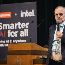 Person giving a presentation in an auditorium