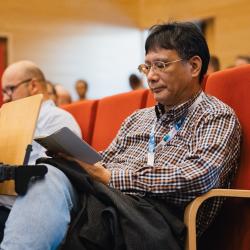 Person listening to a presentation