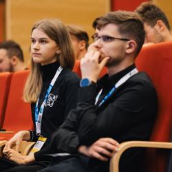 Person listening to a presentation