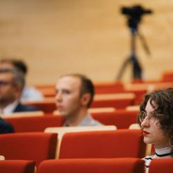 People listening to a presentation