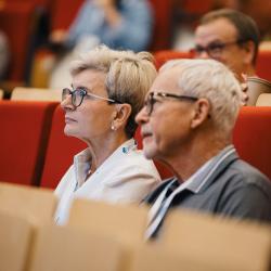 People listening to a presentation