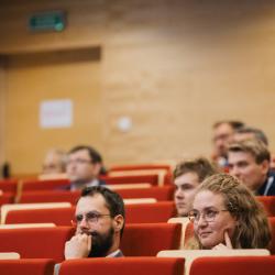People listening to a presentation
