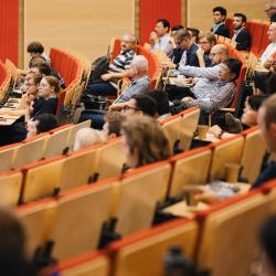 People listening to a presentation