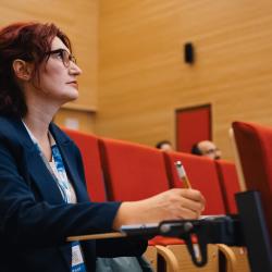 Person listening to a presentation