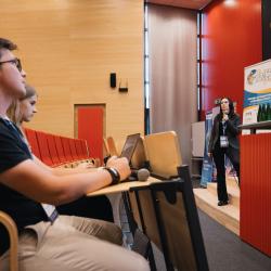 Person listening to a presentation