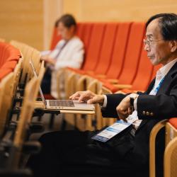 Person listening to a presentation