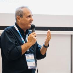 Person talking to a microphone