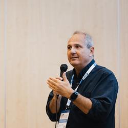 Person talking to a microphone