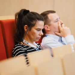 People listening to a presentation