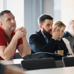 People listening to a presentation