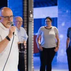 Person talking to a microphone