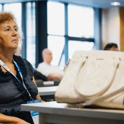 Person listening to a presentation