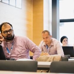 People listening to a presentation