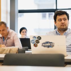 People listening to a presentation