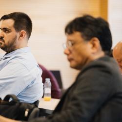 People listening to a presentation