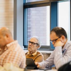 People listening to a presentation