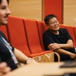 People listening to a presentation