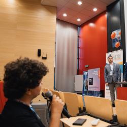 People giving a presentation in a lecture room