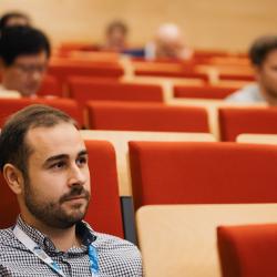 People listening to a presentation