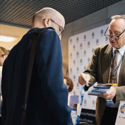 People gathered at an office desk