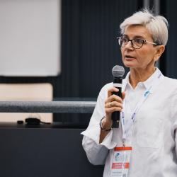 Person talking to a microphone