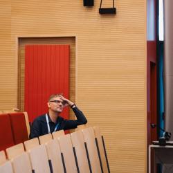 Person listening to a presentation