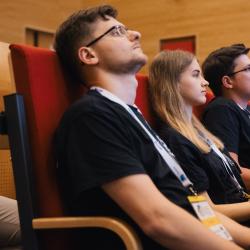 People listening to a presentation