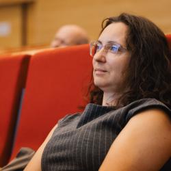 Person listening to a presentation