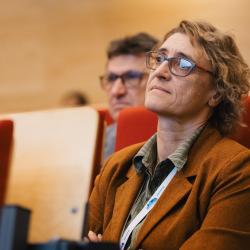 Person listening to a presentation