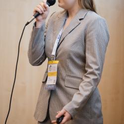 Person talking to a microphone