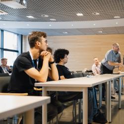 People listening to a presentation