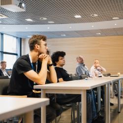 People listening to a presentation