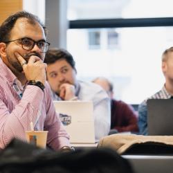People listening to a presentation