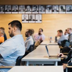 People listening to a presentation