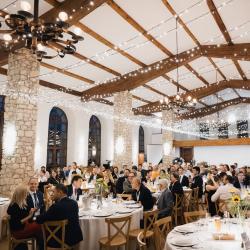 Banquet hall with people sitting at the tables
