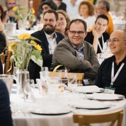 People sitting at the tables