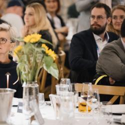 People sitting at the tables