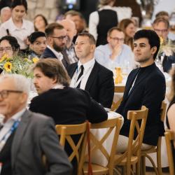 People sitting at the tables