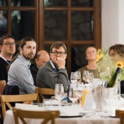 People sitting at the tables