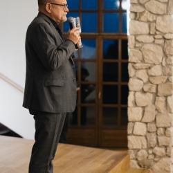 Man speaking to a microphone