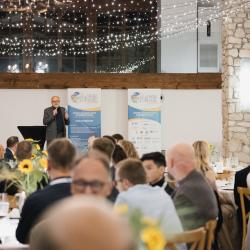 People sitting at the tables